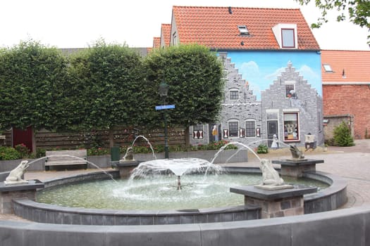 a beautiful graffiti / wall painting of a medieval house in Zierikzee (Zeeland), the Netherlands