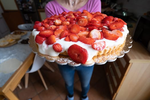 strawberry cake on wooden background, selective focus