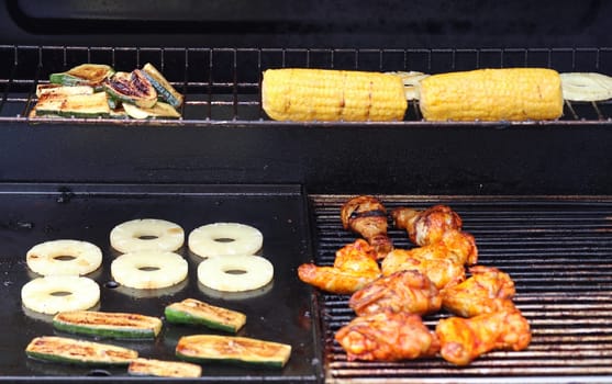 Several pieces of grilled meat on a grill