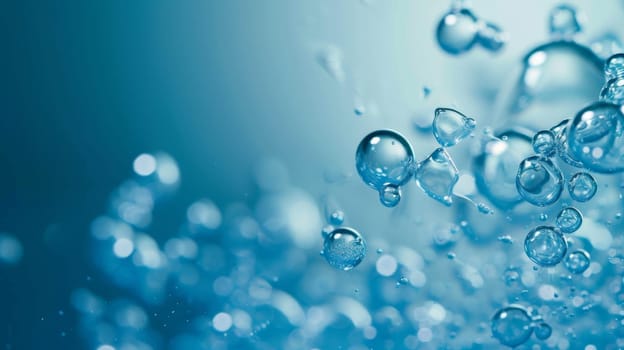 A detailed view of numerous water bubbles against a vibrant blue backdrop. The bubbles appear round and translucent, reflecting light. Some bubbles merge while others remain separate, creating an interesting pattern.
