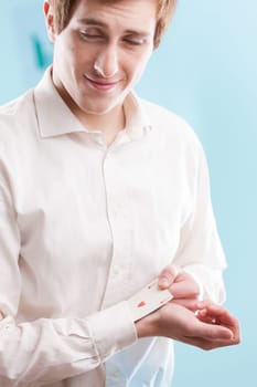 In a blurred blue office, a young redhead man pulls out his secret weapon. It embodies out-of-the-box solutions when best practices aren't enough