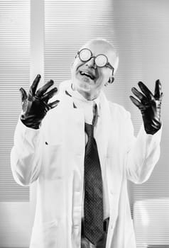 Classic film's evil scientist in monochrome, dramatic in gesture. Seeing humanity as beneath him, he exploits it for his malevolent scheme, involving a worldwide plot with microchips, vaccines, chemtr