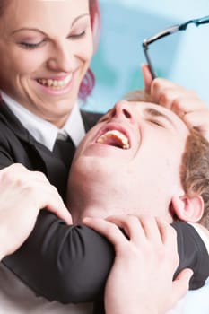 Physical abuse at work by a woman towards a man. Too much power can lead to oppression