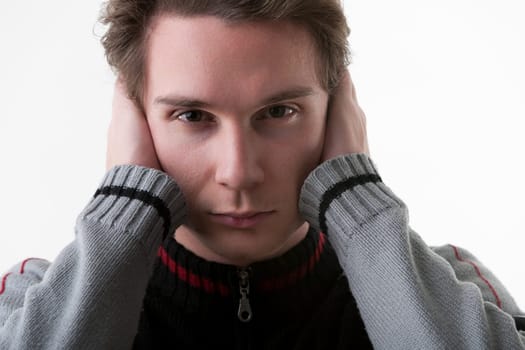 Fake news is overwhelming a man covers his ears, expressing his urge to eliminate the noise. He believes in returning to authentic, human-paced, and accurate sources of information