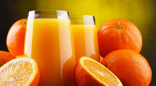 Glasses with freshly squeezed orange juice.