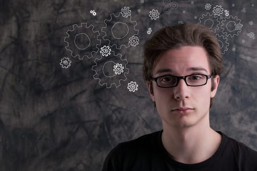 In the realm of creativity and invention, a man stands before grunge, deep in thought. The air showcases gears, ideas, and new creations