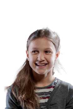 A joyful portrait of a smiling girl in striped attire and grey sweater. Her long hair and normal life, a testament to her happiness