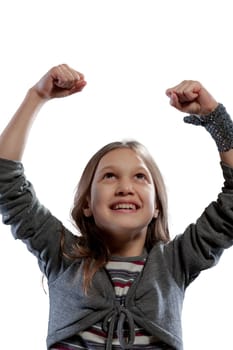 A carefree girl, gleefully laughing, flying free in her world. In a striped top, grey cardigan, jeans and fur boots. Portrait on a white background