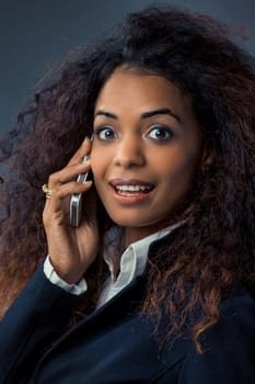 n a digital age, a remarkable black woman employs her cellphone. Born with natural attributes, she commits wholly to her roles, ensuring she rightfully earns her place