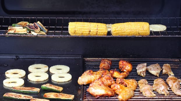 Several pieces of grilled meat on a grill