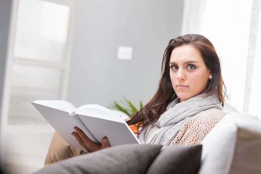Reading is always challenging, as is studying. At the same time it is tiring and sucks up energy and at the same time it nourishes us and fills us with knowledge and new diverse energies. Young woman