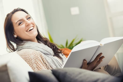 Reading is always challenging, as is studying. At the same time it is tiring and sucks up energy and at the same time it nourishes us and fills us with knowledge and new diverse energies. Young woman