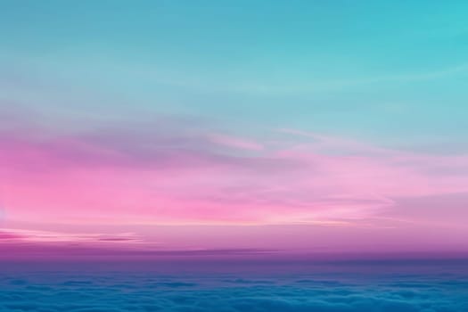 A beautiful scene with a pink and blue sky above fluffy clouds, creating a dreamy and enchanting atmosphere.