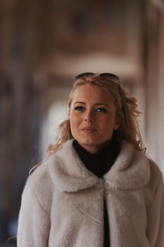 A blonde woman is sightseeing in a historic European city filled with cobblestone streets, archways, marble, and medieval or Gothic elements that have been preserved to appreciate millennial culture a