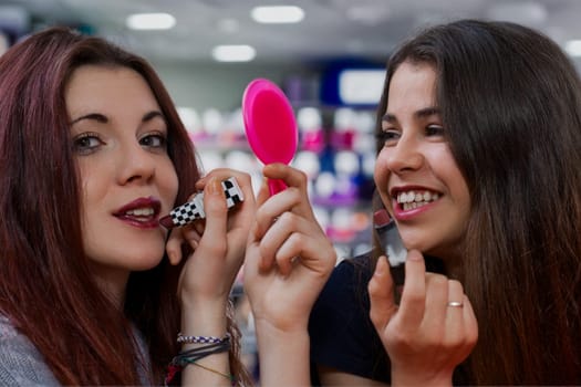 Two stunning young women apply makeup, prepping for dates, supporting each other wholeheartedly. Their friendship is strong now, but life's unpredictability looms. For the moment, they embrace fun, se