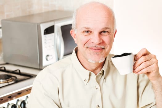 Elderly gentleman, smiling, showcases a coffee cup from which insects crawl. The scene humorously comments on insect-infused foods and dubious sourcing