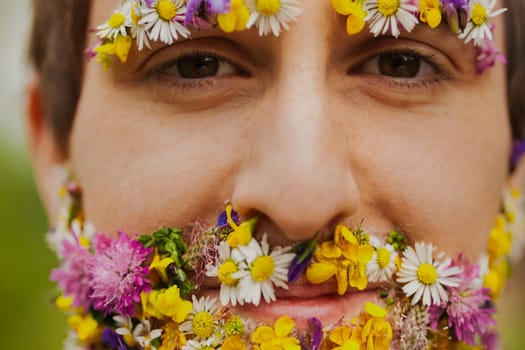 Against a natural backdrop, a redhead exhibits a bloom-filled visage. Fact or fancy, it sings praises of his love for nature. He values eco-awareness, seeking solace in the environment's embrace