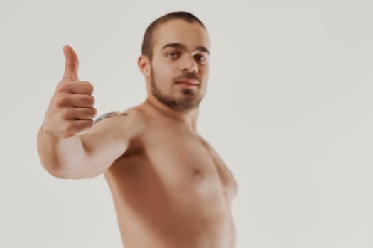 With a supportive gesture, he conveys a strong recommendation, embodying trust and satisfaction
