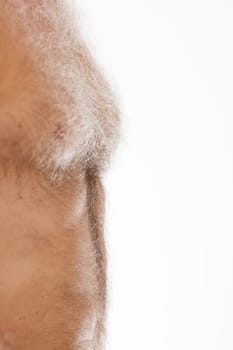 Elderly man's torso with textured skin speaks to the natural aging process