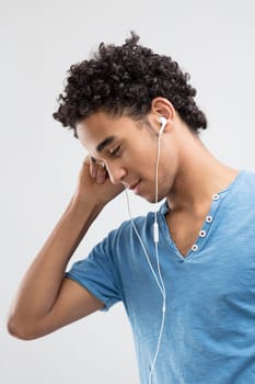 Man touches his temple, possibly moved by the melodies
