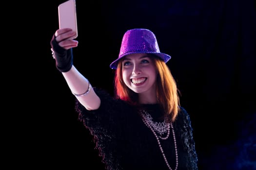 The exuberant musician takes a break for a selfie, her smile as bright as her sparkly attire