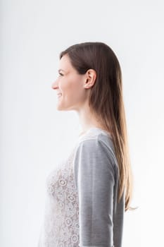 Serenity personified in the profile of a woman enjoying a light-hearted moment