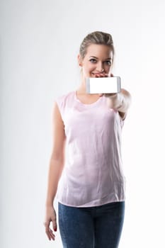 Cheerful presenter with mobile phone portrays potential of technology