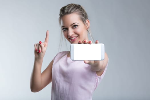 Tech-friendly model with mobile phone gestures towards technological possibilities
