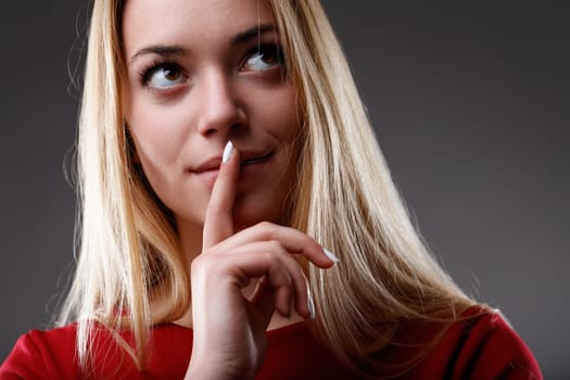 playful secret, a silent gesture, she captures the essence of a quiet moment