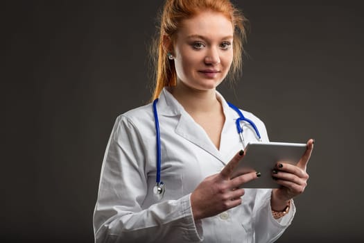 healthcare worker engaged with technology, showcasing the modern face of medicine