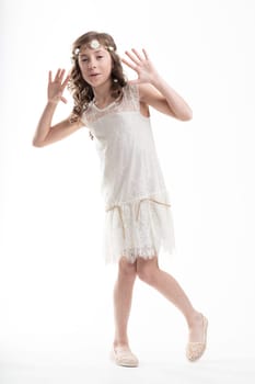 Playful girl emulates the Charleston dancers of the Roaring Twenties