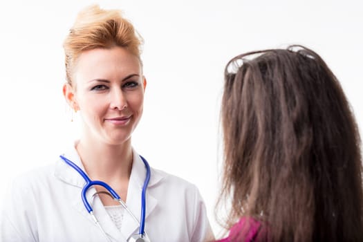 Positive doctor-patient interaction highlighted by a healthcare worker's encouraging smile