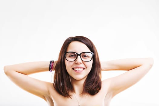 Exuberant and relaxed, the woman with stylish eyewear and a joyful demeanour lights up the space