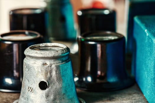 watchmaker's metal guards, each a protector of precision, carry the scars and patina of service