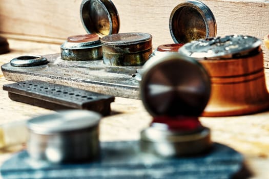 Craftsman's table: watches, gears, springs - a testament to the art of watchmaking. Steampunk ambiance, combined with vintage charm, showcases the precision and skill required