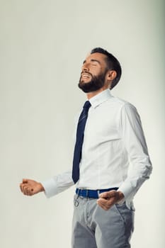 Feeling of victory and relaxation captured as businessman unwinds from tension