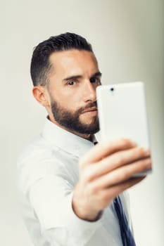 Man in formal attire demonstrates the importance of internet connectivity in modern business