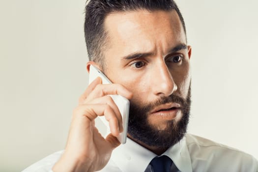 Business communicator in deep concentration, illustrating the stresses and demands of corporate negotiations