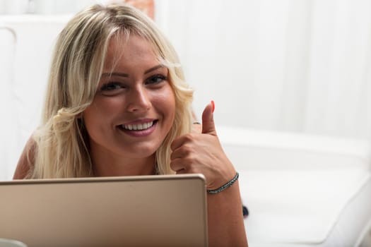 Successful blonde entrepreneur in influencer marketing. She plans strategies, monitors trends, and is data-driven. Well-educated, she keeps abreast of social media changes