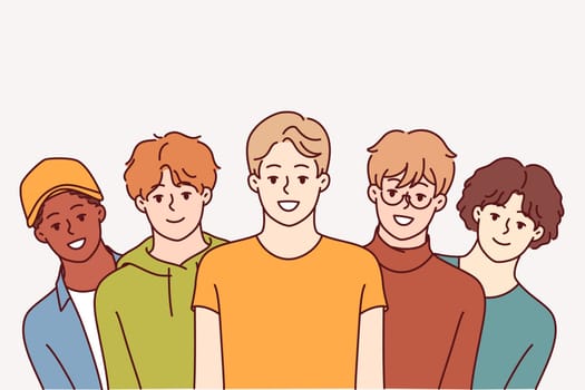 Group of high school guys smile and look at screen, for concept of multi-ethnic society. Positive teenage boys in casual clothes offer to join youth community or become member of university fraternity