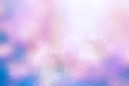 Abstract blurred fresh vivid spring summer light delicate pastel blue pink white bokeh background texture with bright circular soft color lights. Beautiful backdrop illustration.