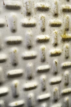 Detail of a rough and rusty metal plate due to the passage of time