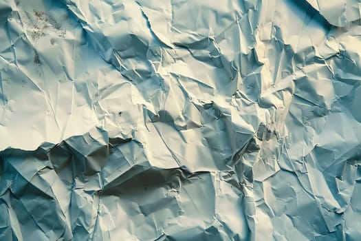 A vibrant piece of paper adorned with an intricate blend of blue and white hues, creating a sense of movement and tranquility.
