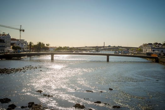 Tavira, Portugal, April 12th 2024: View on Rio Gilao in Tavira from the old Roman Bridge