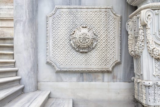 Aged marble wall of imperial Ottoman summer Ihlamur Pavilion with carved pattern ornaments and carved details, Istanbul, Turkey