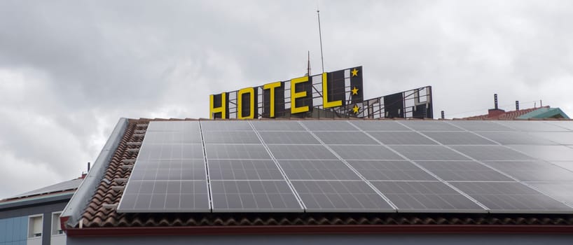 Solar panels on the roof of hotel. use of renewable energy in the hospitality sector