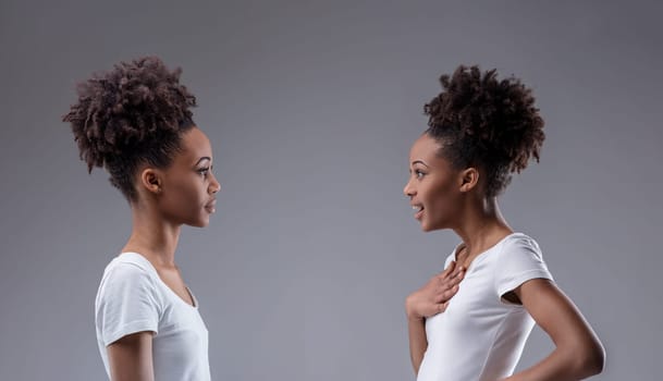 Introspective conflict captured: black woman scorns her reflection's shock, a self-contemplative scrutiny in play