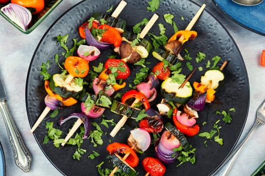 Vegetable skewers, grilled vegetables or barbecue vegetables on wooden skewers.