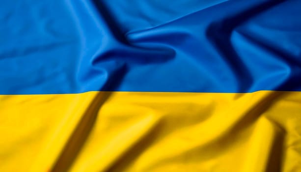Beautiful silk flag of Ukraine with soft folds in the wind.