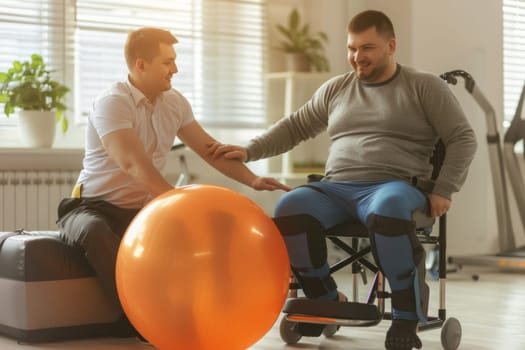 Physical therapist motivates a male patient with a gym ball during rehabilitation to improve his mood